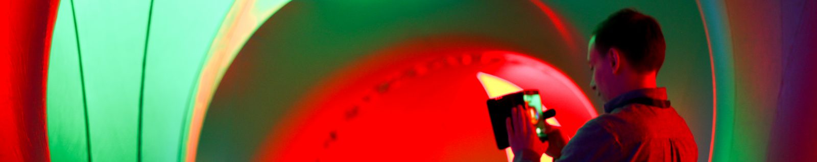 Live video content being recorded inside the colourful Luminarium installation